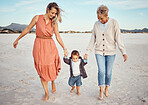 Beach, mother and grandma with boy holding hands having fun, bonding and walking. Family, care and grandmother, mom and kid or child enjoying holiday time together outdoors on sandy seashore or coast
