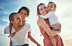 Happy family, blue sky and ocean, piggy back and hug for couple with kids on summer holiday at beach. Love, family and fun, man and woman smile with children sea for vacation time together at sunset.