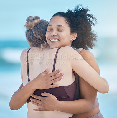 Buy stock photo Friends, women and hug after exercise outdoor, happy and calm at the beach with love and fitness together. Support, trust and friendship, workout motivation by the ocean and wellness with zen smile.