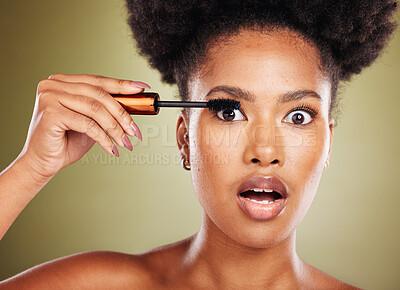 Buy stock photo Black woman, surprise eyes and cosmetics mascara or makeup, natural beauty and skincare glow in studio. African girl model, facial cosmetology wellness and eyelash product care with shocked face