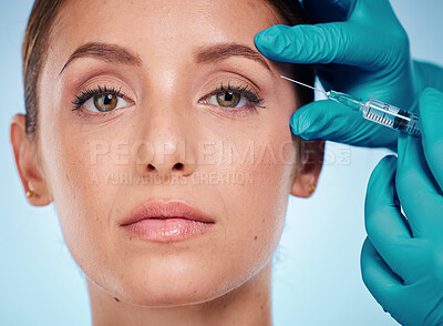 Buy stock photo Plastic surgery, skincare and woman with injection, healthcare and on blue studio background. Female, girl and fillers with cosmetics, wellness and face care for health, soft and smooth skin for beauty