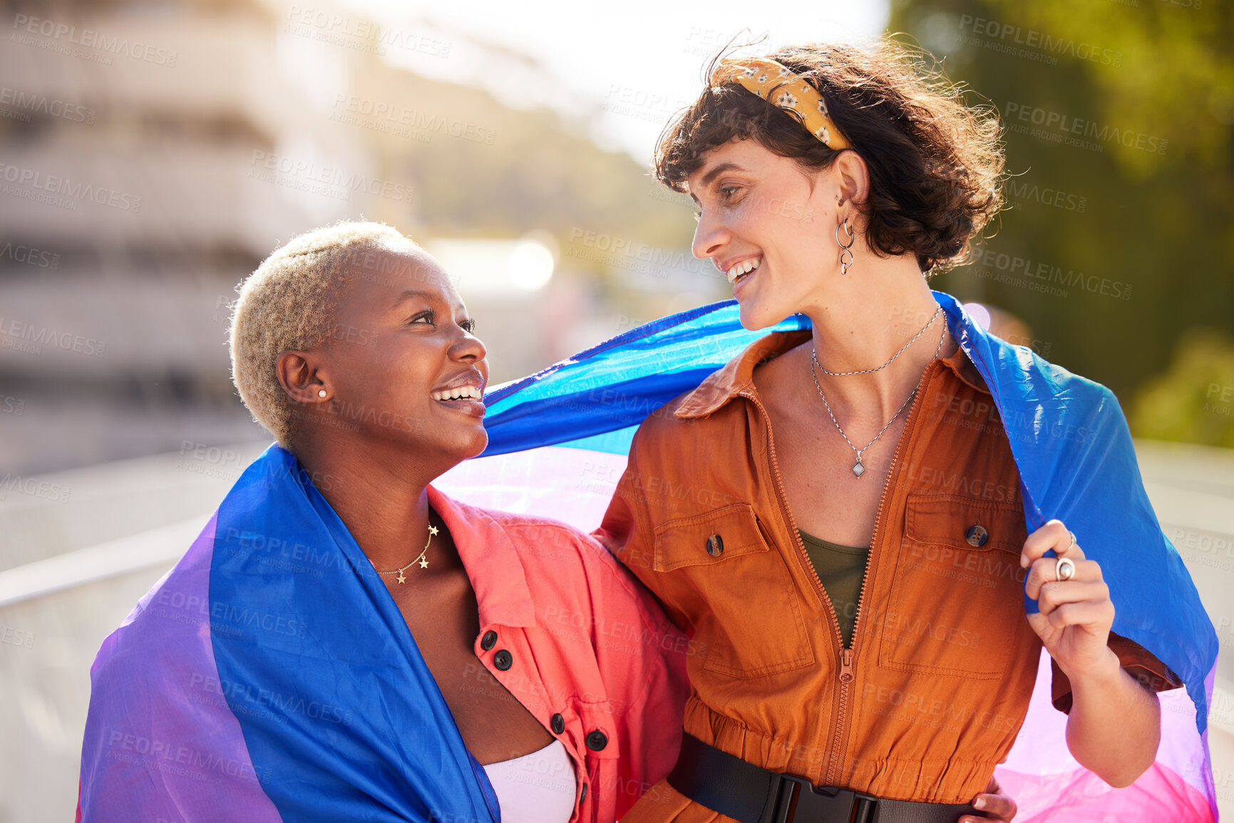 Buy stock photo Friends, city and pride flag in street with support, smile and solidarity with human rights for lgbt people. Women, non-binary march, parade and diversity in urban metro for lgbtq, equality and peace