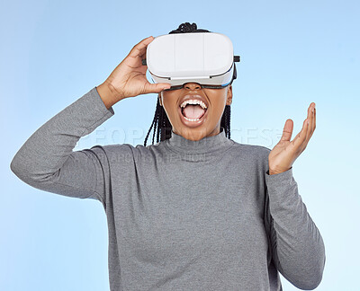 Buy stock photo Happy, gaming and vr with black woman and headset in metaverse for future, cyber or 3d system. Media, ui and technology with gamer for internet, augmented reality or digital in blue background studio