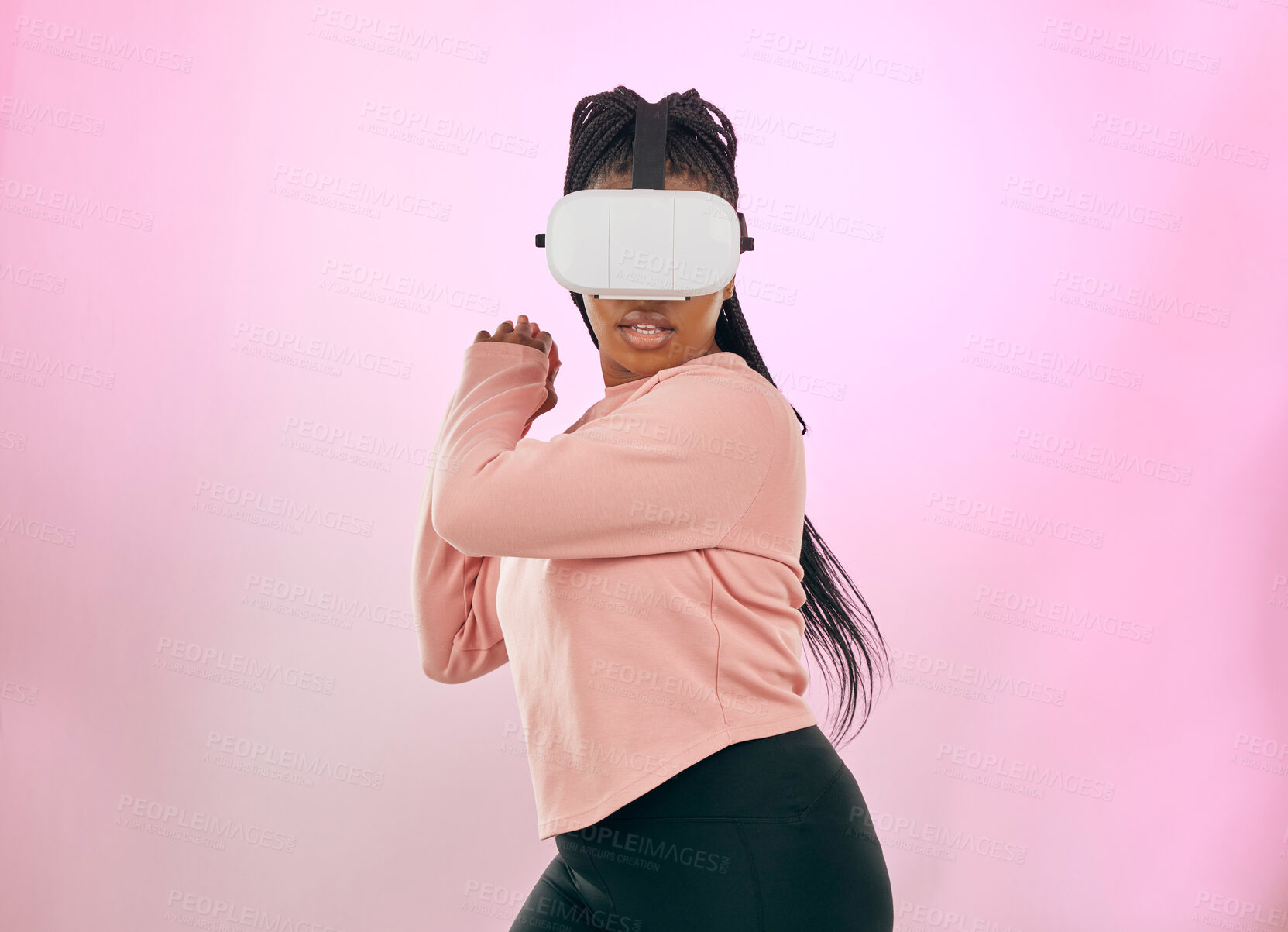 Buy stock photo Black woman, VR and gamer in the metaverse for futuristic gaming or activity against a pink studio background. African American female in 3D virtual reality game with headset in the future on mockup