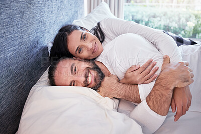 Buy stock photo Happy, couple and portrait together in bed, home or waking up on the weekend, morning or sleeping in on a holiday. Relax, smile and face with happiness or people, lying in room or hug in bedroom 