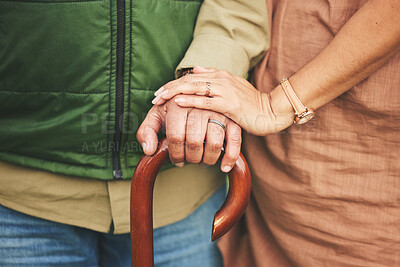 Buy stock photo Closeup, hands and couple with support, cane and retirement with solidarity, marriage or appreciation. Zoom, touching or senior man with old woman, love or care with empathy, understanding or comfort