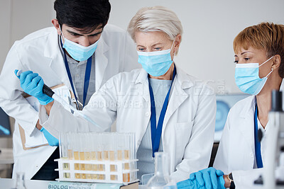 Buy stock photo Research, covid team and employees in a lab for healthcare innovation, medical analytics or science. Medicine, education and scientists with face mask and teamwork to study a liquid or chemical