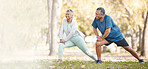 Fitness, stretching and senior couple in park for healthy body, wellness and active workout outdoors. Retirement, sports and man and woman stretch legs on grass for exercise, training and warm up