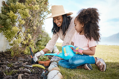 Buy stock photo Gardening, mother and child water a plant in backyard learning environmental, organic and nature skills. Landscaping, family and happy girl with mom watering and planting sprout in soil for growth