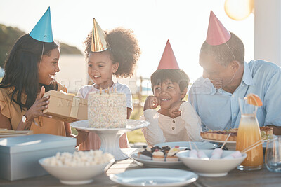 Buy stock photo Birthday, parents and children with cake in park for event, celebration and party outdoors together. Family, social gathering and mother, father with kids at picnic with cake, presents and surprise
