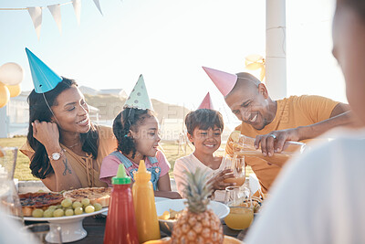 Buy stock photo Birthday, parents and kids with food in park for event, celebration and party outdoors together. Family, social gathering and mother, father with children at picnic with juice, presents and cake