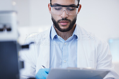 Buy stock photo Results, man or scientist writing research notes for analysis on experiment, information or innovation. Biologist, biotechnology or researcher in a laboratory with documents for science development 