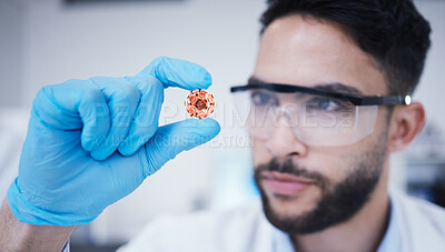 Buy stock photo Man, studying or scientist with bacteria for research analysis, healthcare breakthrough or future innovation. Hand, biotechnology or biologist in a laboratory for virus cure or science development