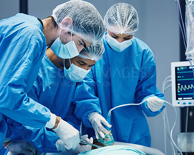 Buy stock photo Group of doctors in surgery, healthcare and surgical procedure start with PPE and team in theatre in hospital. Medical operation, health insurance and safety gear with surgeon people in clinic