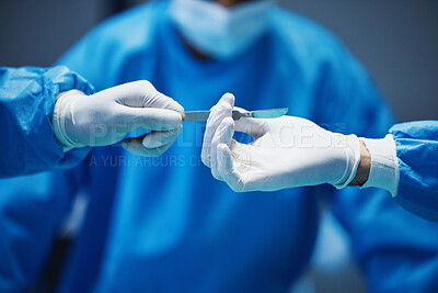 Buy stock photo Hospital knife, surgery and doctors hands in theatre for medical support, teamwork and emergency healthcare. Doctor, nurse and surgeon team work, giving tools and helping in operating room zoom
