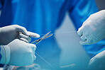 Surgery, hands and doctor cut thread, stitching patient and surgical procedure with health insurance. People in medicine, surgeon with scissors and medical tools with collaboration in hospital