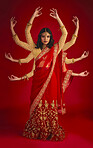 Indian woman, studio and culture with mudra, portrait and magic for culture, yoga and fashion by red background. Girl, model and beauty for fantasy, jewellery and art with clothes for festive event