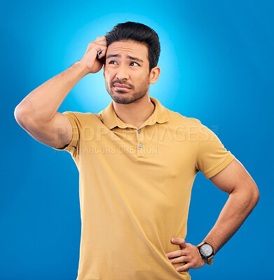 Buy stock photo Thinking, studio ideas and man brainstorming solution, problem solving plan or strategy development. Planning, why and confused person think of questions, decision or doubt choice on blue background
