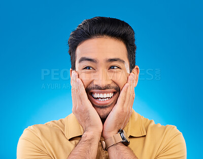 Buy stock photo Happy, excited man and surprise face in studio with Asian model with teeth and joy. Blue background, male person and casual fashion with handsome and friendly guy with modern style and wow smile
