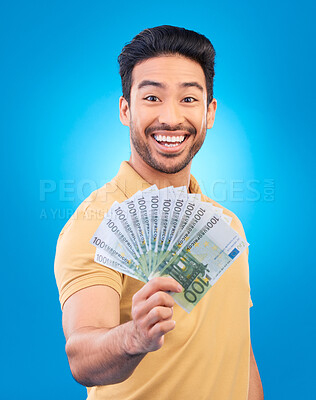 Buy stock photo Happy man, portrait and money fan for bonus offer, financial success and winning, finance loan or cashback bonus. Young asian person or winner notes or cash profit isolated on studio blue background
