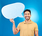 Man, speech bubble and studio portrait with smile for opinion, social media and poster by blue background. Indian guy, student or model with billboard, mockup space and cardboard sign for promotion