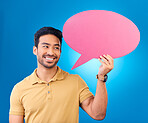 Happy, speech bubble and thinking Asian man for communication, feedback or chat. Excited, idea and a person with a board for conversation isolated on a blue background in a studio with space