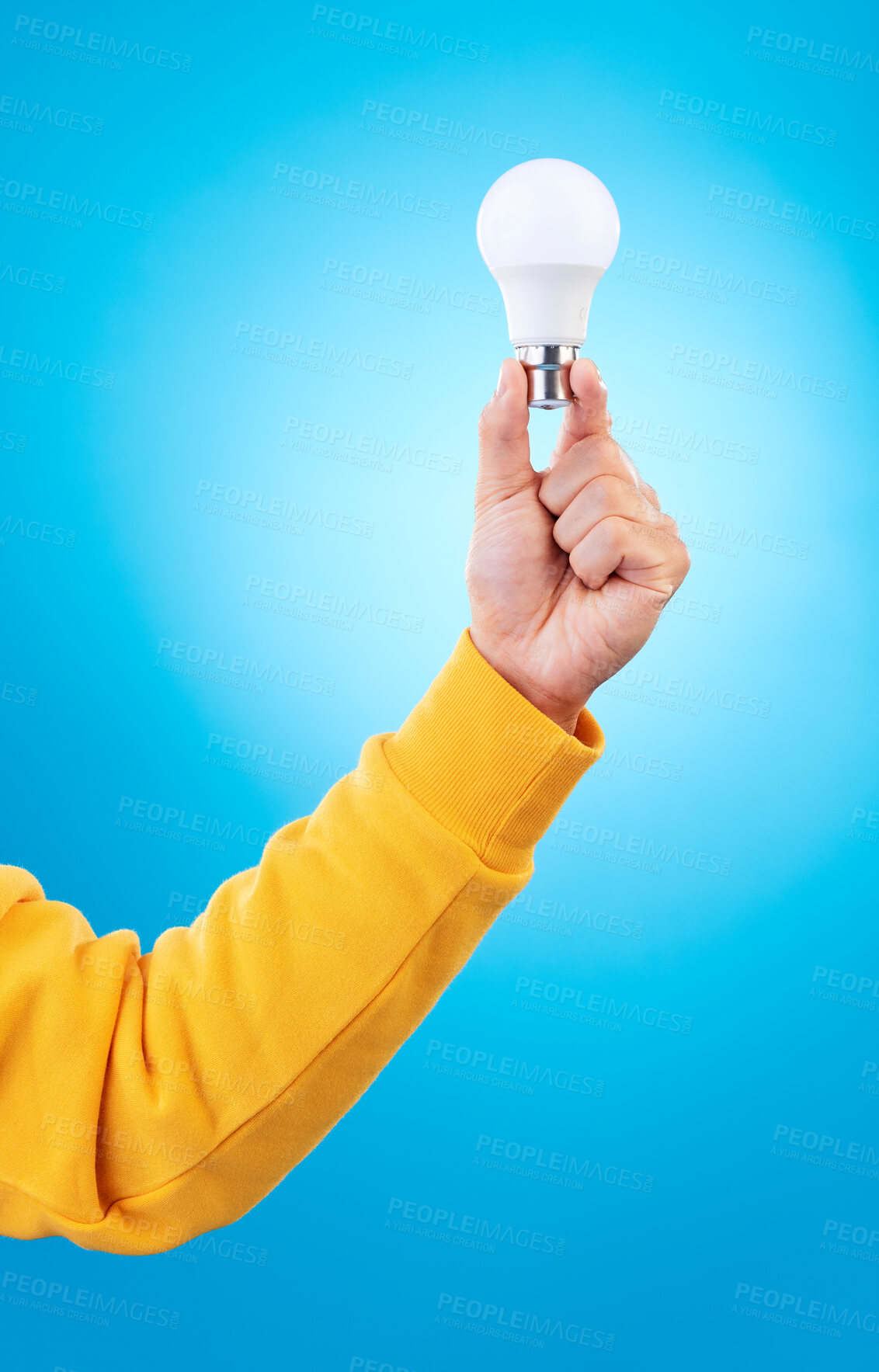 Buy stock photo Thinking, lightbulb ideas and hands of person with solution, problem solving plan or strategy development. Innovation, light bulb and studio model with entrepreneurship inspiration on blue background