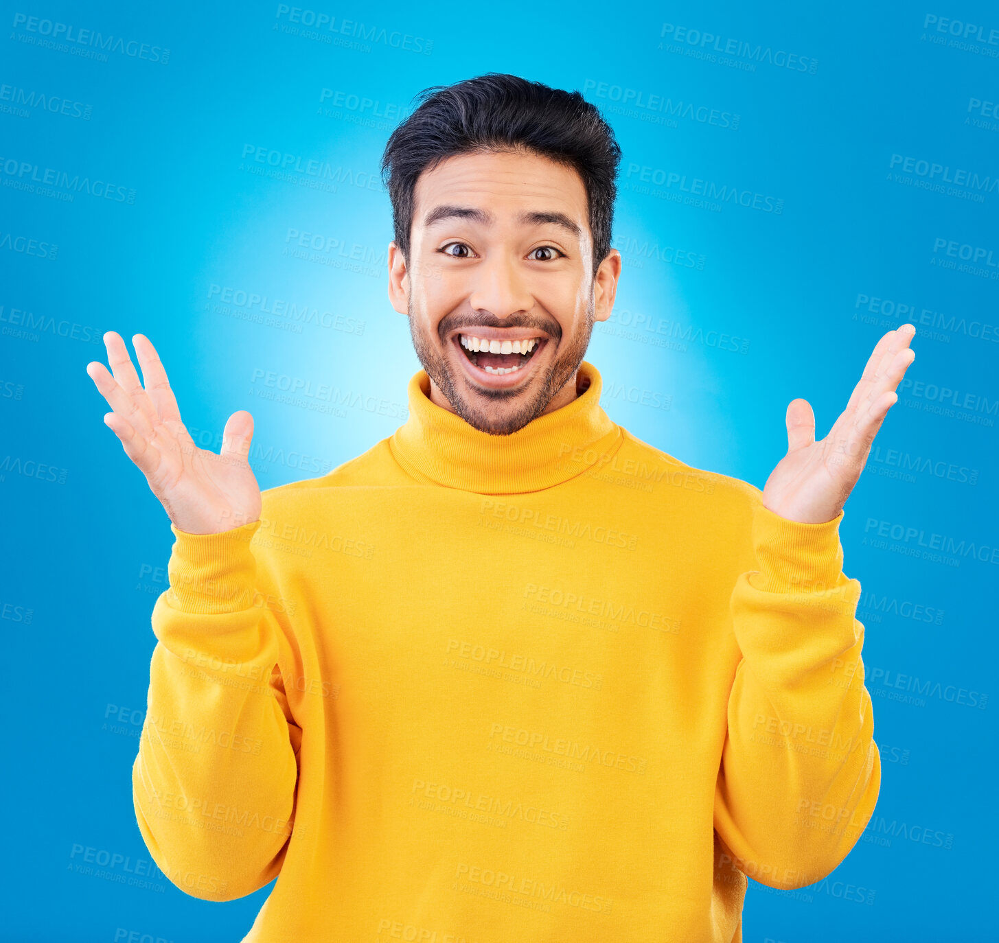 Buy stock photo Wow, excited man and surprise portrait in studio with Asian model with teeth and joy. Blue background, male person and casual fashion with handsome and friendly guy with modern style and happy