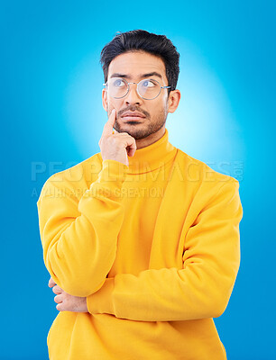 Buy stock photo Thinking, why and studio man planning solution, problem solving plan or strategy ideas, curious or doubt. Remember, wonder or person think of questions, decision or choice isolated on blue background