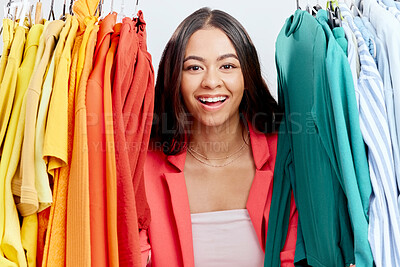 Buy stock photo Fashion, choice and clothes with portrait of woman in studio for decision, shopping and wardrobe. Boutique, retail and store with face of customer on white background for search, creative and sale