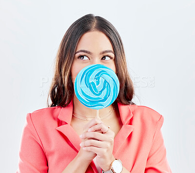 Buy stock photo Thinking, lollipop and woman with ideas, sweets and happiness against a white studio background. Decision, female person and model with candy, dessert and treats with fantasy, choice and creativity