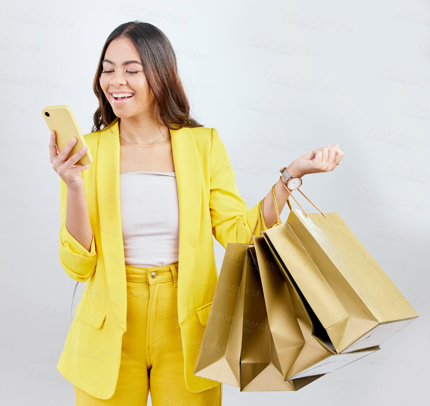 Buy stock photo Fashion, phone or woman on social media with shopping bags for retail sale, product offer or discount code. Online, mobile app or girl customer with gift or present on promotion on white background