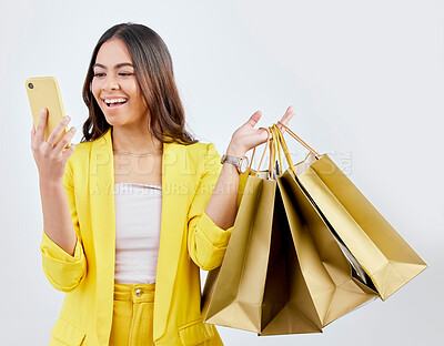 Buy stock photo Fashion, phone or happy woman on social media with shopping bags for a sale, offer or discount code. Online, mobile app or excited girl customer with gift or present on promotion on white background