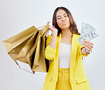 Money, shopping bag or portrait studio woman with cash dollar bills, discount reward or bonus prize. Luxury giveaway, sales or fashion customer, winner or person with savings deal on white background