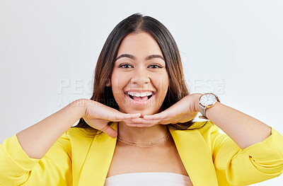Buy stock photo Hands on chin, excited and face of woman in studio isolated on a white background. Portrait, skincare and person pose for beauty, fashion or facial treatment for healthy skin, wellness or aesthetic.