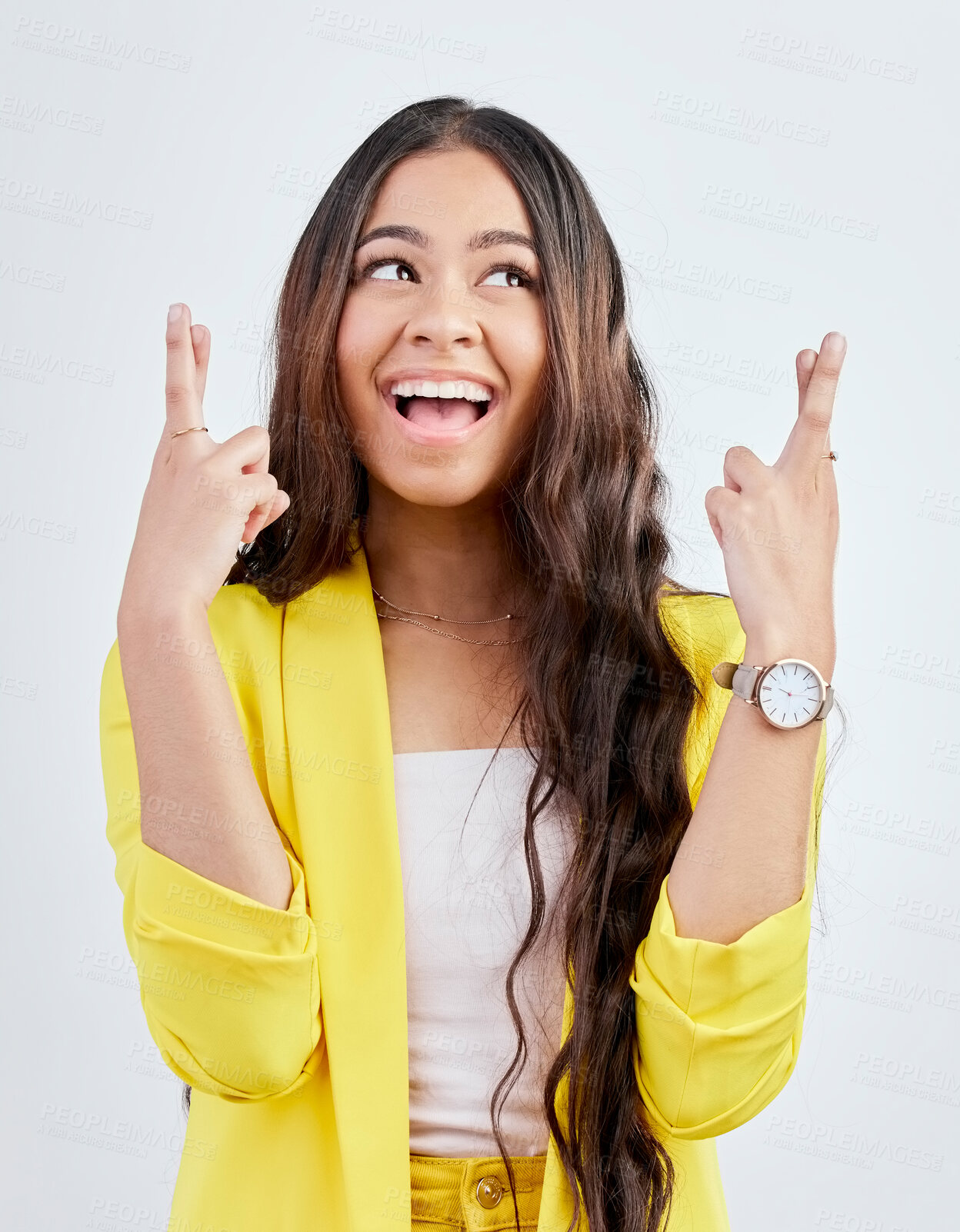 Buy stock photo Hope, fingers crossed and face of woman in studio with hand gesture for winning, good luck and wish. Winner, white background and excited female person for competition, promotion and lottery bonus