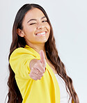 Portrait, support and woman with thumbs up, promotion and success against a white studio background. Wink, female person or model with hand gesture, achievement or like with symbol or positive review