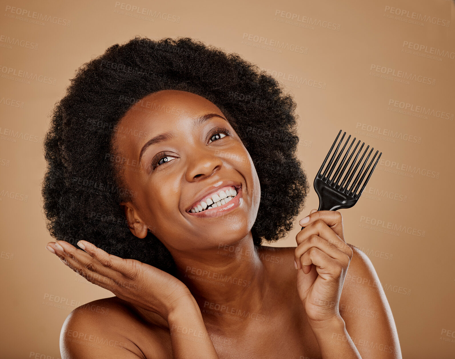 Buy stock photo Hair, comb and an excited model black woman in studio on a brown background for beauty or cosmetics. Aesthetic, afro and haircare with a happy young female person thinking about natural cosmetics