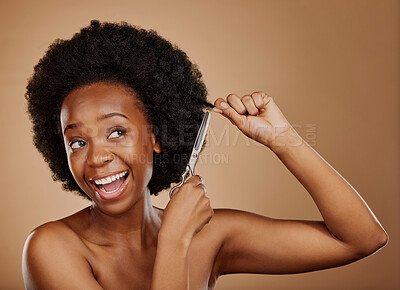 Buy stock photo Haircut, scissors or excited black woman with afro in studio on a brown background for positive change. Smile, transformation or happy natural African at hairdresser salon for hairstyle or beauty 