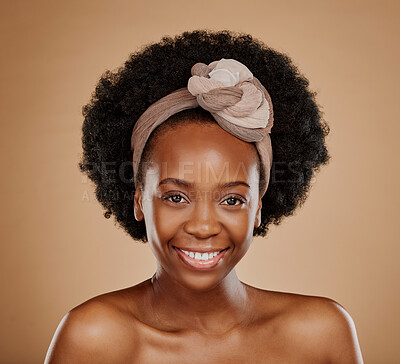 Buy stock photo Black woman, face and hair scarf for afro in studio isolated on a brown background for skincare. Natural cosmetics, portrait and happy African model with head wrap after salon treatment for hairstyle