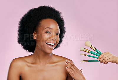 Buy stock photo Portrait, smile and black woman with makeup, brushes and dermatology against a studio background. Face, female person or model with cosmetic tools, salon treatment and luxury with skincare and beauty