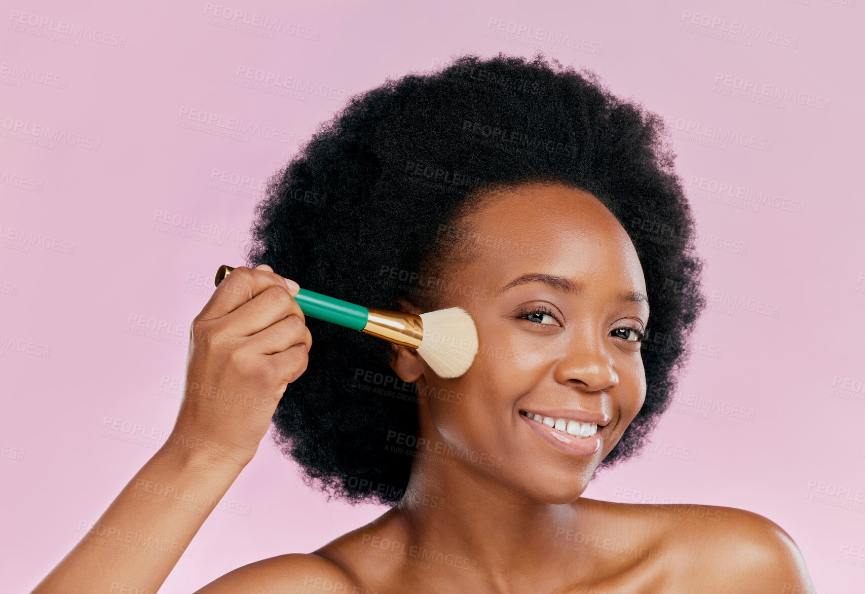 Buy stock photo Black woman, brush and makeup with beauty and portrait, foundation or powder application on pink background. Cosmetic tools, skincare and African female model, cosmetology and self care in studio
