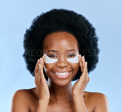 Buy stock photo Beauty, skincare and eye mask with portrait of black woman in studio for facial, cosmetics or dermatology. Spa, wellness and self care with face of person on blue background for salon, glow and detox