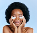 Beauty, skincare and eye mask with face of black woman in studio for facial, cosmetics and dermatology. Spa, wellness and self care with female person on blue background for salon, glow and detox