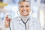 Portrait, medical and stethoscope with an old woman doctor in the hospital for cardiology or treatment. Healthcare, heart health and wellness with a senior female medicine professional in a clinic