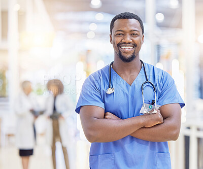 Buy stock photo Portrait, nurse and black man with arms crossed, smile and healthcare in hospital. Medical professional, face and confident surgeon, African doctor or worker with pride for career, job and wellness
