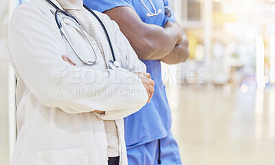 Buy stock photo Hands, doctors and team with arms crossed in hospital, clinic and medical support. Closeup of people, expert collaboration or healthcare staff ready for service with pride, help and trust in medicine