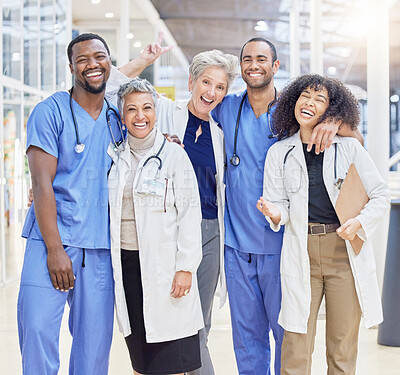 Buy stock photo Happy portrait, team and doctors for healthcare service, leadership and teamwork in hospital diversity. Professional medical woman, mentor and internship nurses in group, funny peace sign or excited