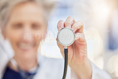 Buy stock photo Hand, stethoscope and doctor listening to heart for healthcare in wellness hospital. Medical professional, expert and cardiology equipment, tools or exam to monitor pulse for health checkup in clinic