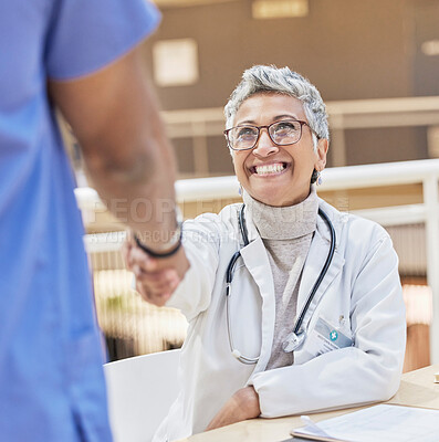 Buy stock photo Senior doctor, handshake and introduction, thank you and congratulations, smile and gesture with health. Welcome, communication and support in medicine, female medical professional and shaking hands